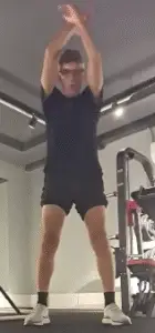 Showing the Cross Arm Swing exercise