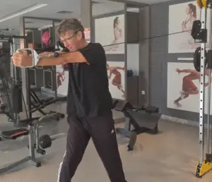 showing a still image from the Cable Oblique Twist video - a gym exercise for obliques