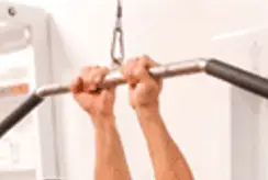 Shows a zoom in of the supinated narrow grip pull-down hands position