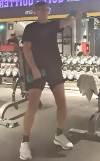 showing the alternating dumbbell front raise