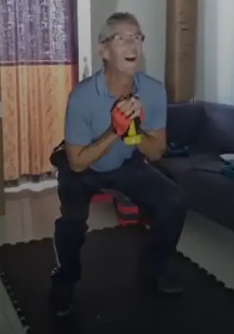 showing a sitll image from the goblet squat video - one of the best leg exercises