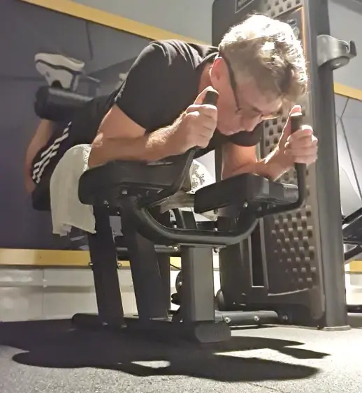 showing the Leg Curl exercise form - one of the best Leg exercises you can do - a great accomaniment to the sitting ham stretch