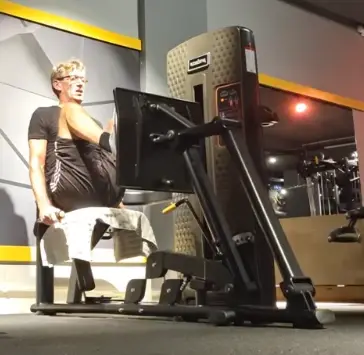 showing a still image from my leg press video - a leg press exercise machine in action - one of the best Leg exercises you can do
