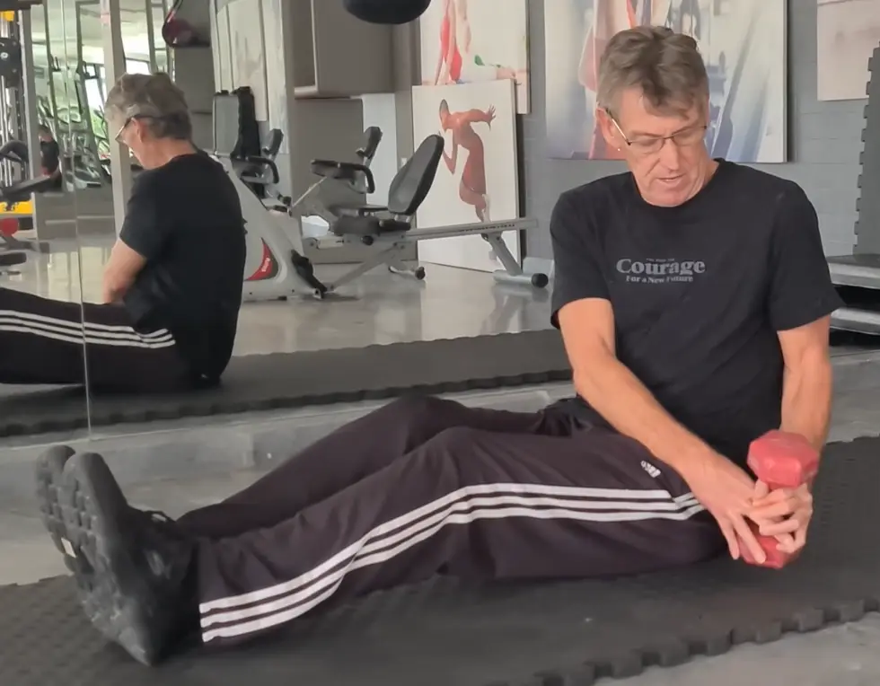 showing the Russian Twist gym exercise