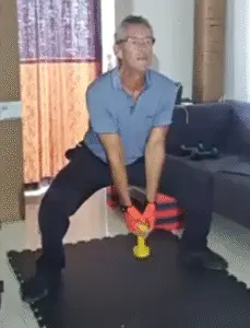 showing a still image from the dumbbell - sumo squat video