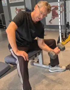 showing a still image if my Bicep Concentration Curl video using a Dumbbell - grreat for mixing with the Seated Dumbbell Curl