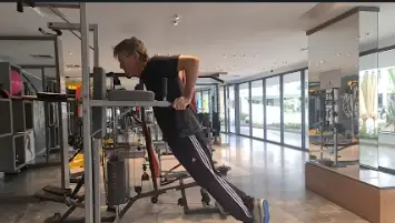 Showing the Bar Dip gym exercise for the Chest, Shoulders and Triceps.