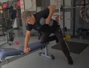Showing a still image from the Dumbbell Bench Row video - one of my key Back Lessons