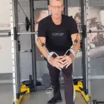 Showing a still from the Standing Cable Fly video - a gym exercise for the Chest