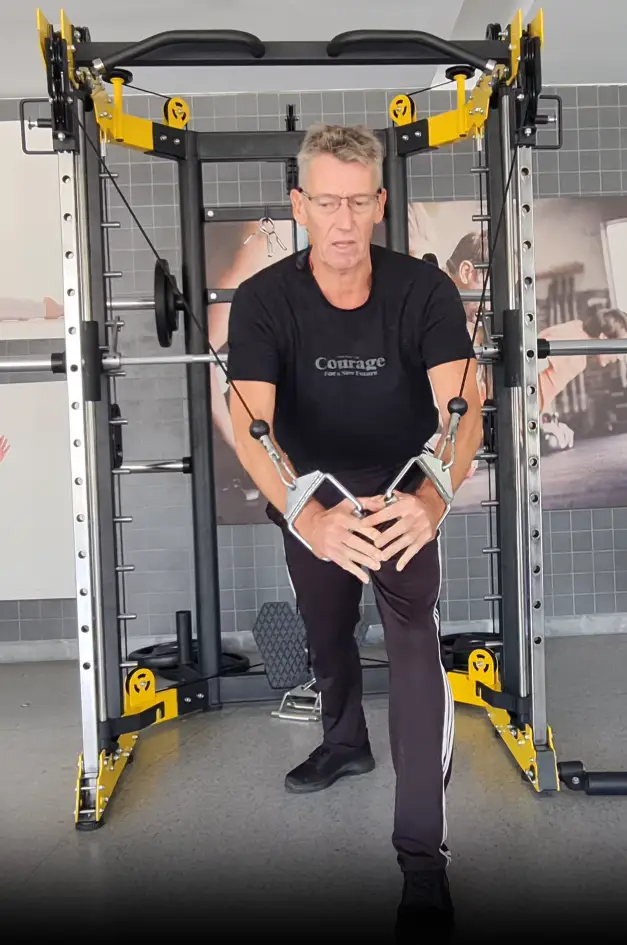 Showing a still from the Standing Cable Fly video - a gym exercise for the Chest