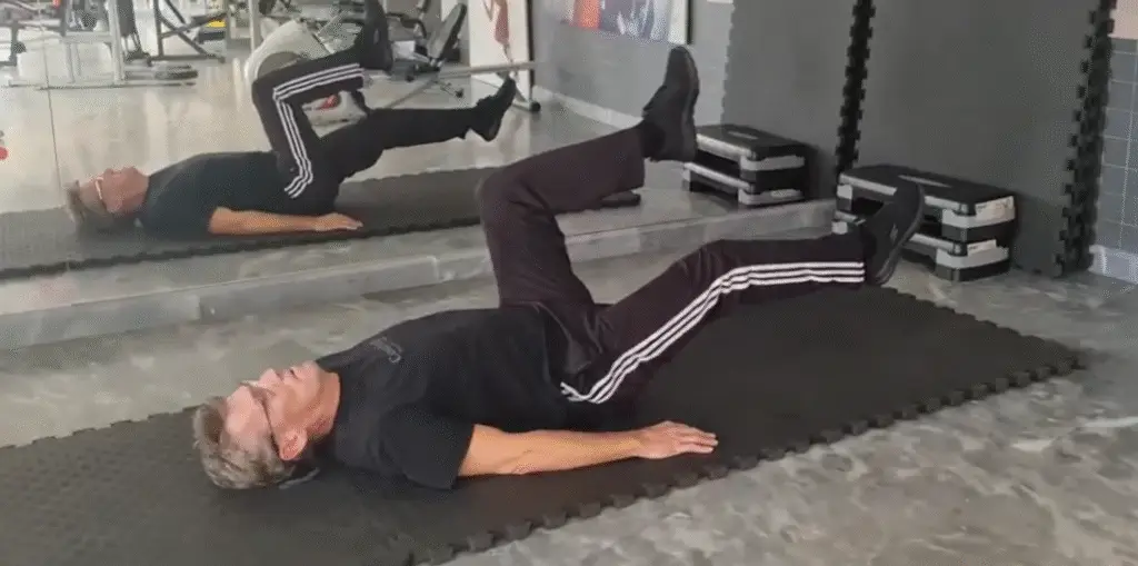 a picture showing the Tabletop Toetap - related to the Bicycle Crunch for Abs and Core