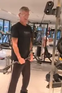 Showing the Tricep Pull-Down for Triceps - at the Bottom Position - one of the best Tricep exercises