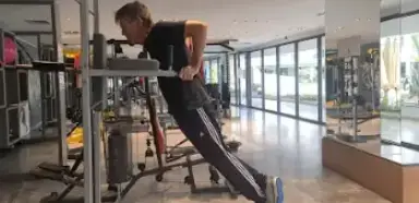 Shows a still image from the Bar Dip video - a gym exercise for Chest, Shoulders, & Triceps