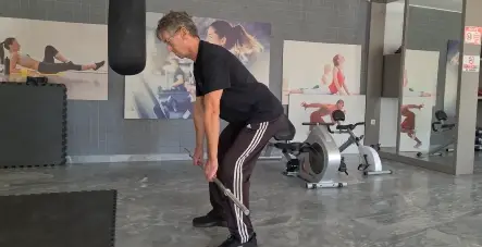 showing a still image from my Bent Over Barbell Row video - a top rated gym exercise for Back