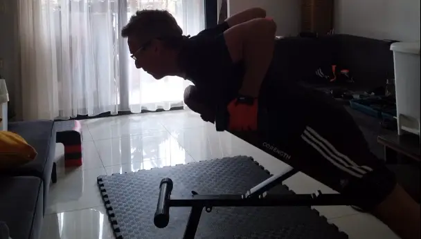 showing the Chest Supported Incline Dumbbell Row exercise for the Back muscles