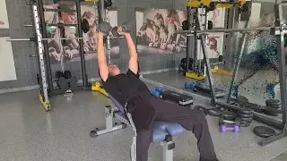 Shows a still image from the incline dumbbell fly video