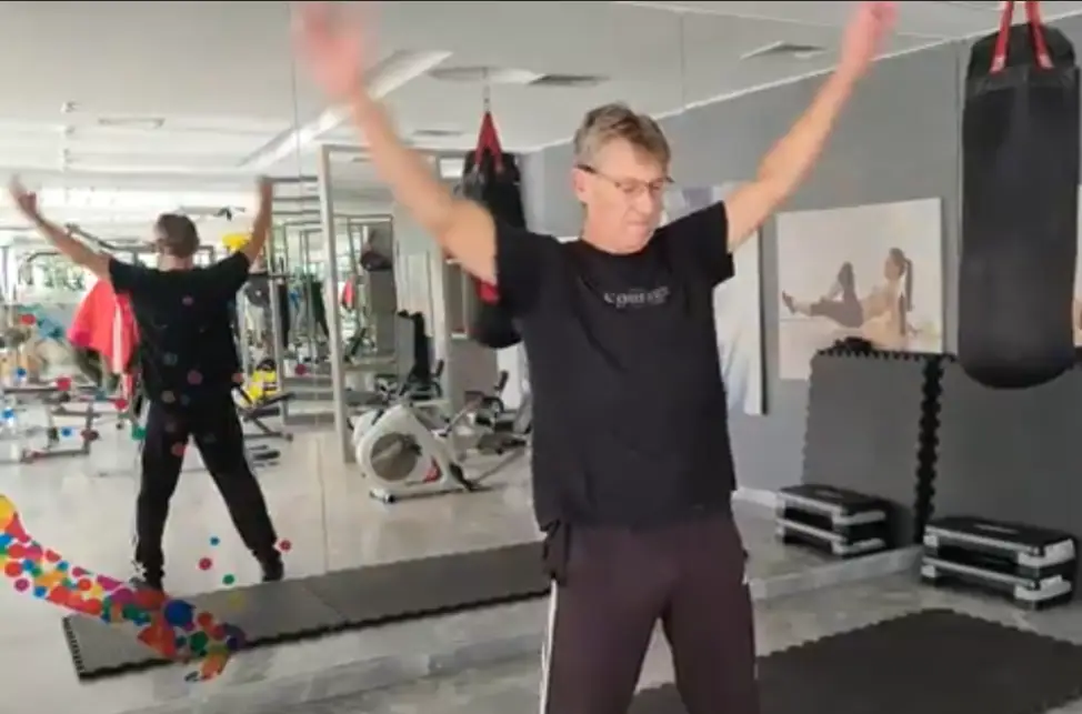 shows a still image of the Forward Arm Rotation exercise which I use in conjunction with the Cross Arm Swing and the Chest Spin
