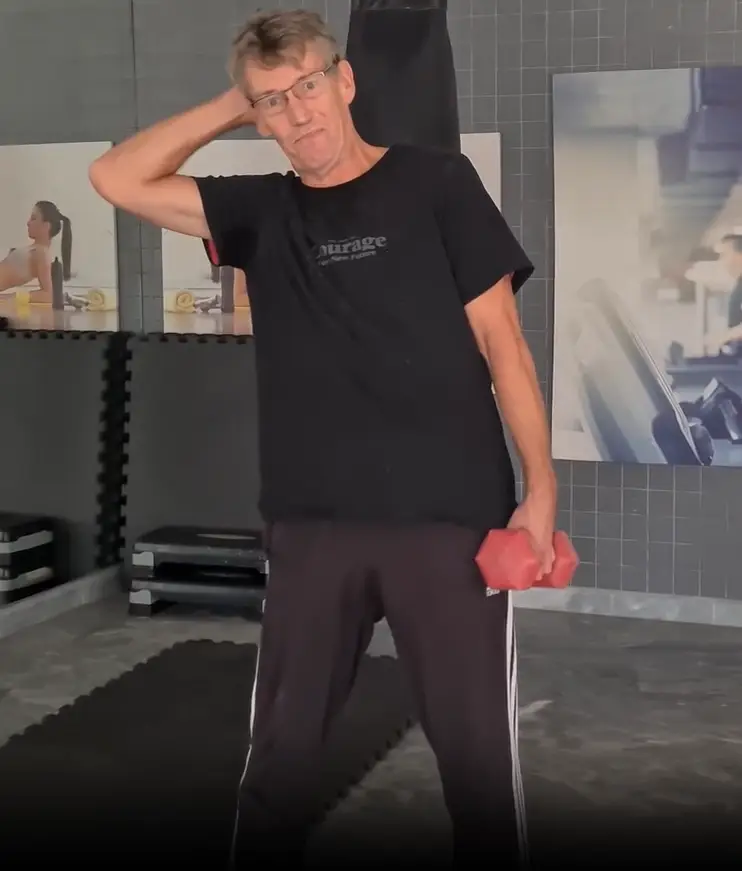 shows a still image from my Dumbbell Side bend video - limiting the Range of Motion and using muscle tension and engagement