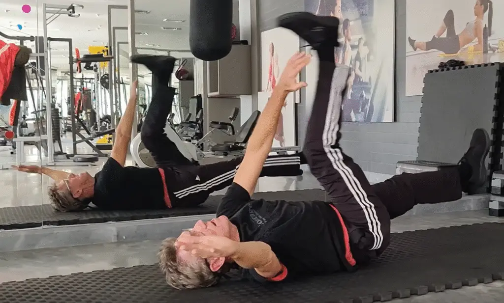 Shows a still image from my Deadbug video - a truly effective exercise for Core and Abs muscles - one of my Intermediate Pilates Lessons