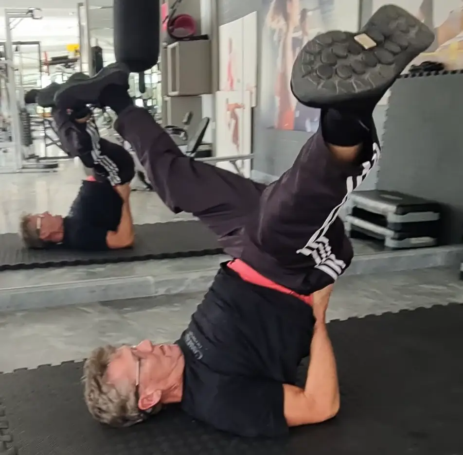 shopws a still image fro my Legs Up Scissors video - a great bodyweight exercise to get a good natural groin stretch. Great for improving Stability and Balance