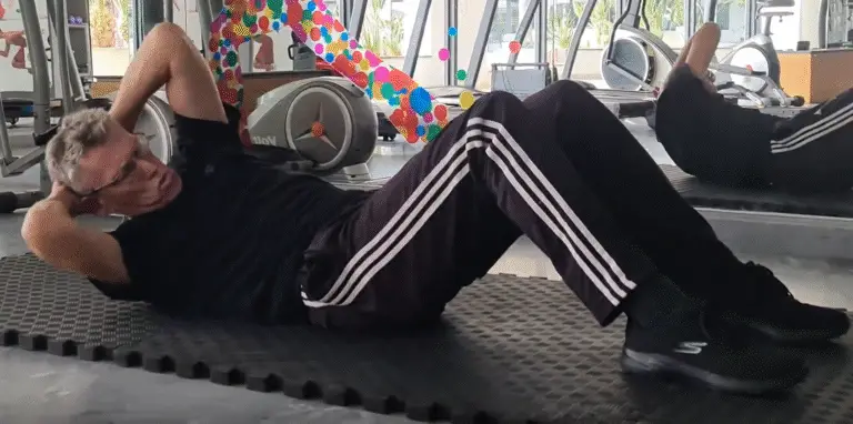 shows a still image from my Upper Circle Crunch video - an all-round ABS crunching exercise
